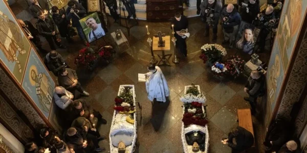 Київ попрощався із журналісткою та оператором телеканалу FreeДом, що загинули у Краматорську